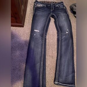 Rock Revival jeans with rhinestone back pockets.